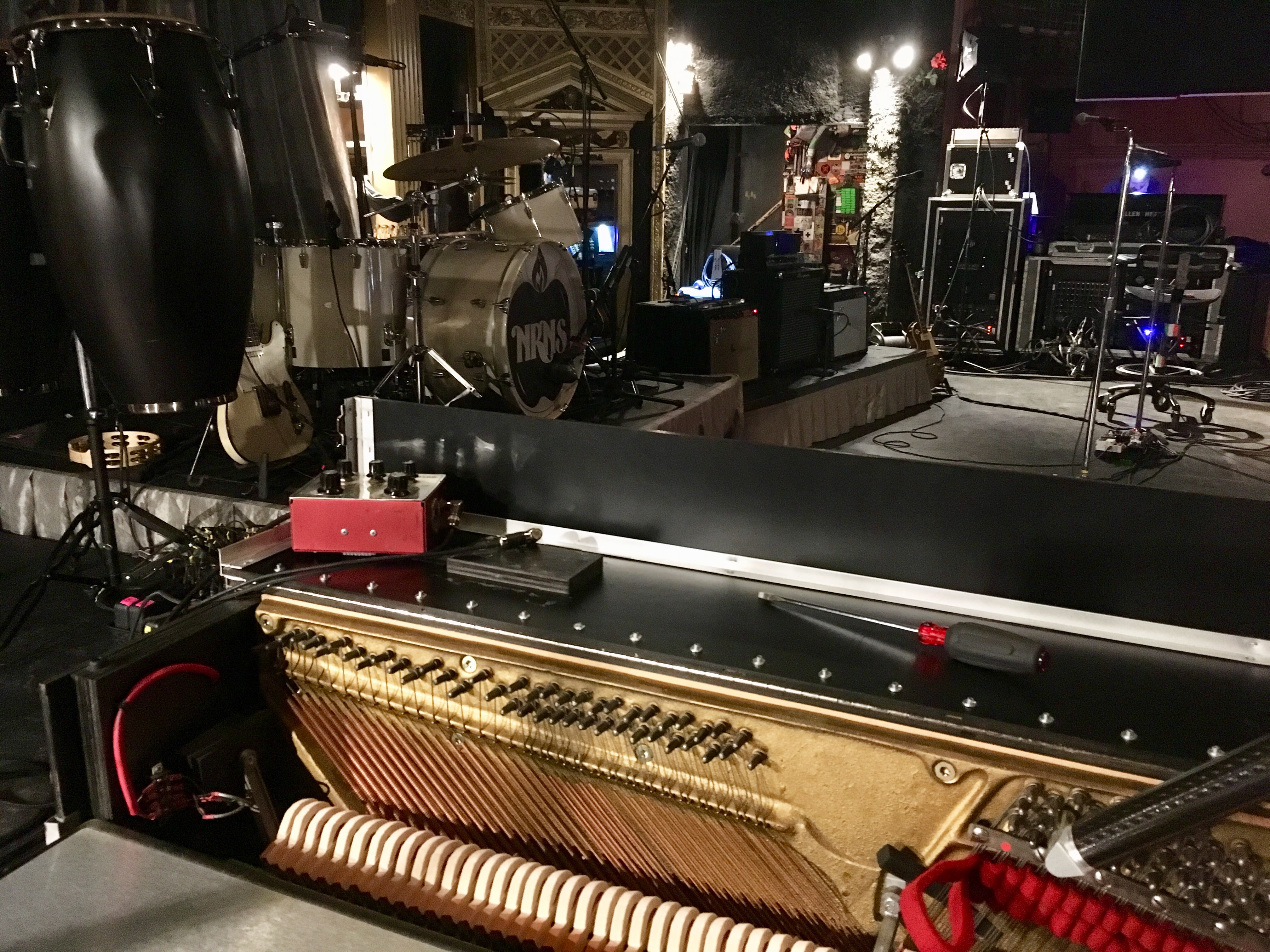 An open piano action on a professional performance stage